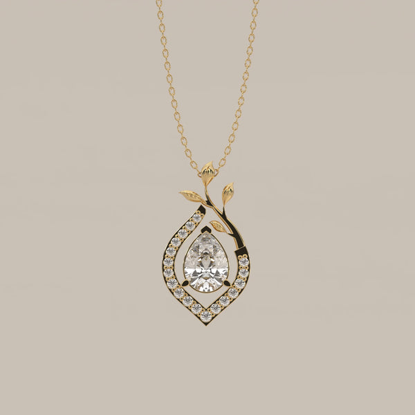 Pear Lab Grown Diamond Pendant in a Pave Teardrop with Leaf Vine in yellow gold, shown from the front.