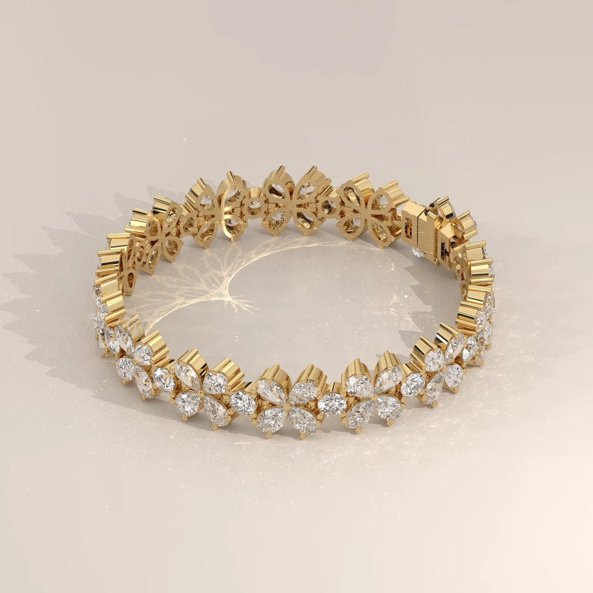 Pear Petal Flower Lab Grown Diamond Bracelet with Round Centres in yellow gold, photographed at a three-quarter angle.