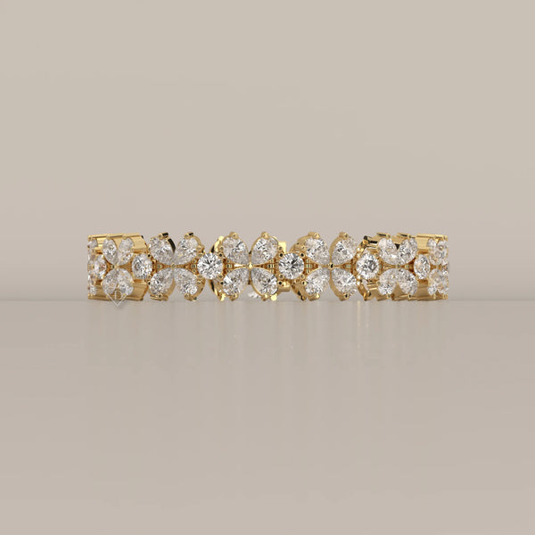 Pear Petal Flower Lab Grown Diamond Bracelet with Round Centres in yellow gold, shown from the front.