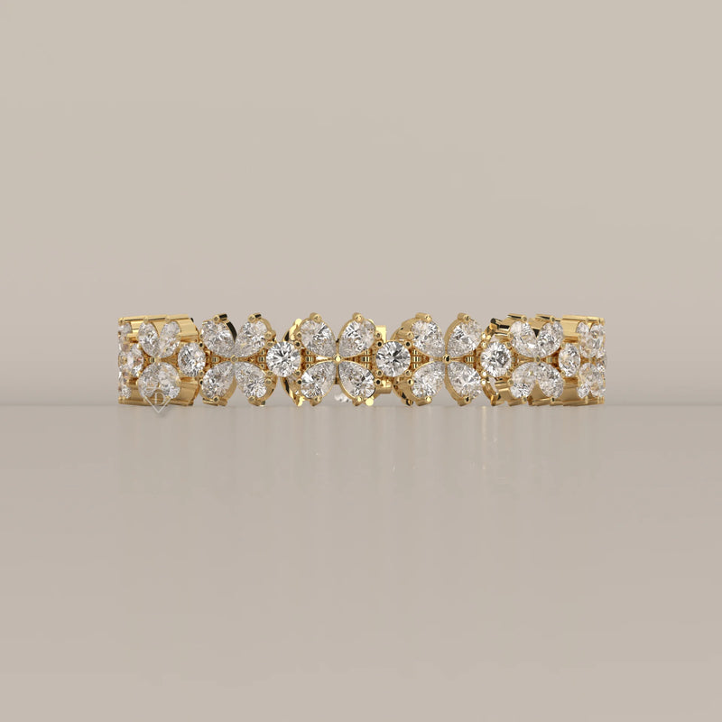 Pear Petal Flower Lab Grown Diamond Bracelet with Round Centres in yellow gold, shown from the front.
