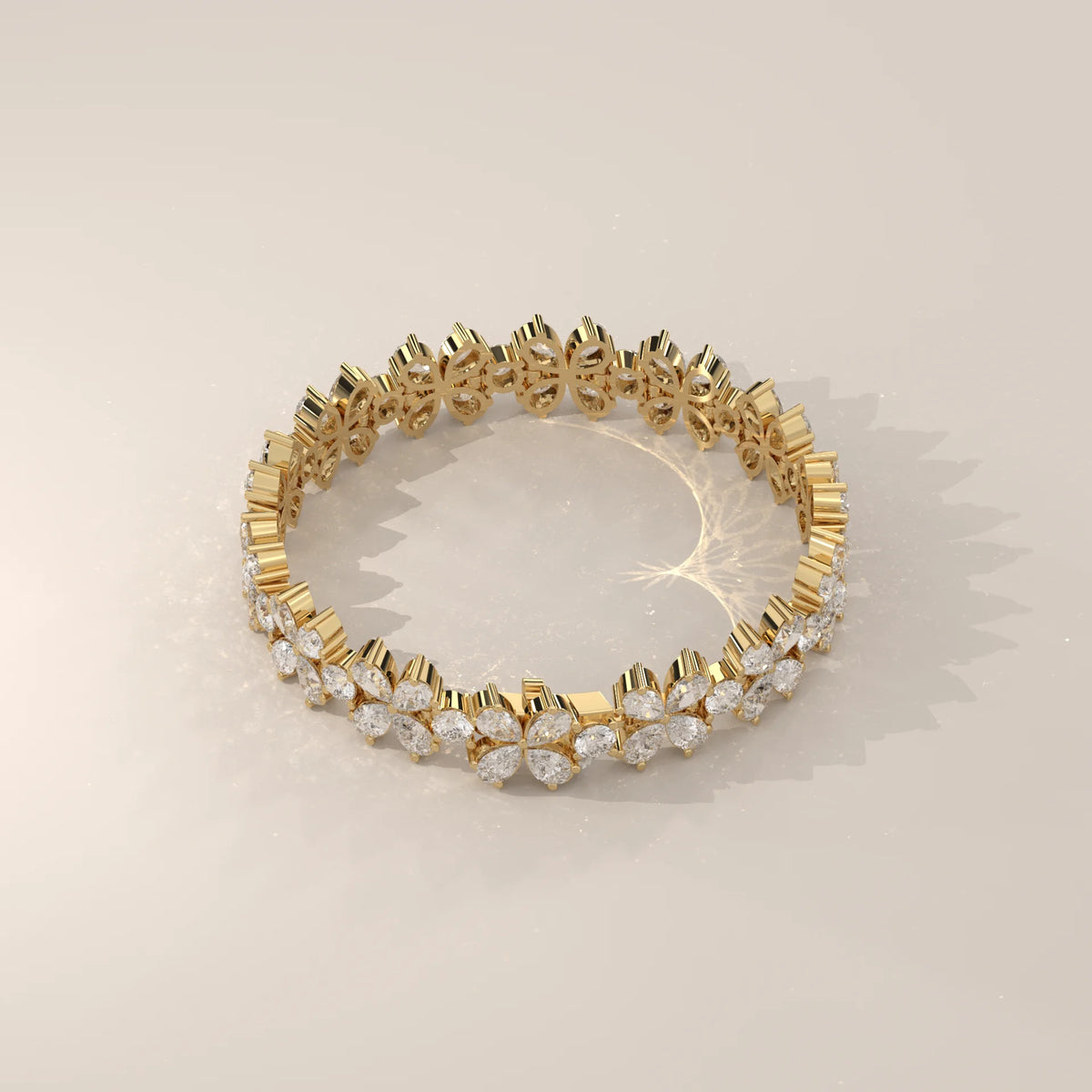 Pear Petal Flower Lab Grown Diamond Bracelet with Round Centres in yellow gold, shown on a plain background.