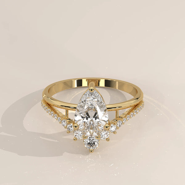 Three-Quarter View: Pear Diamond Engagement Ring with Cluster Setting in Yellow Gold – Lab Grown – Driona Jewels