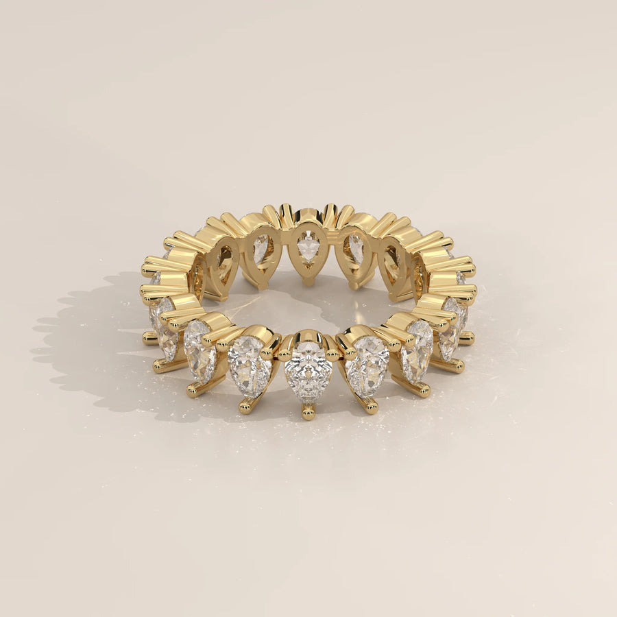 Three-Quarter View: Pear Diamond Eternity Band with Eternity Setting in Yellow Gold – Lab Grown – Driona Jewels