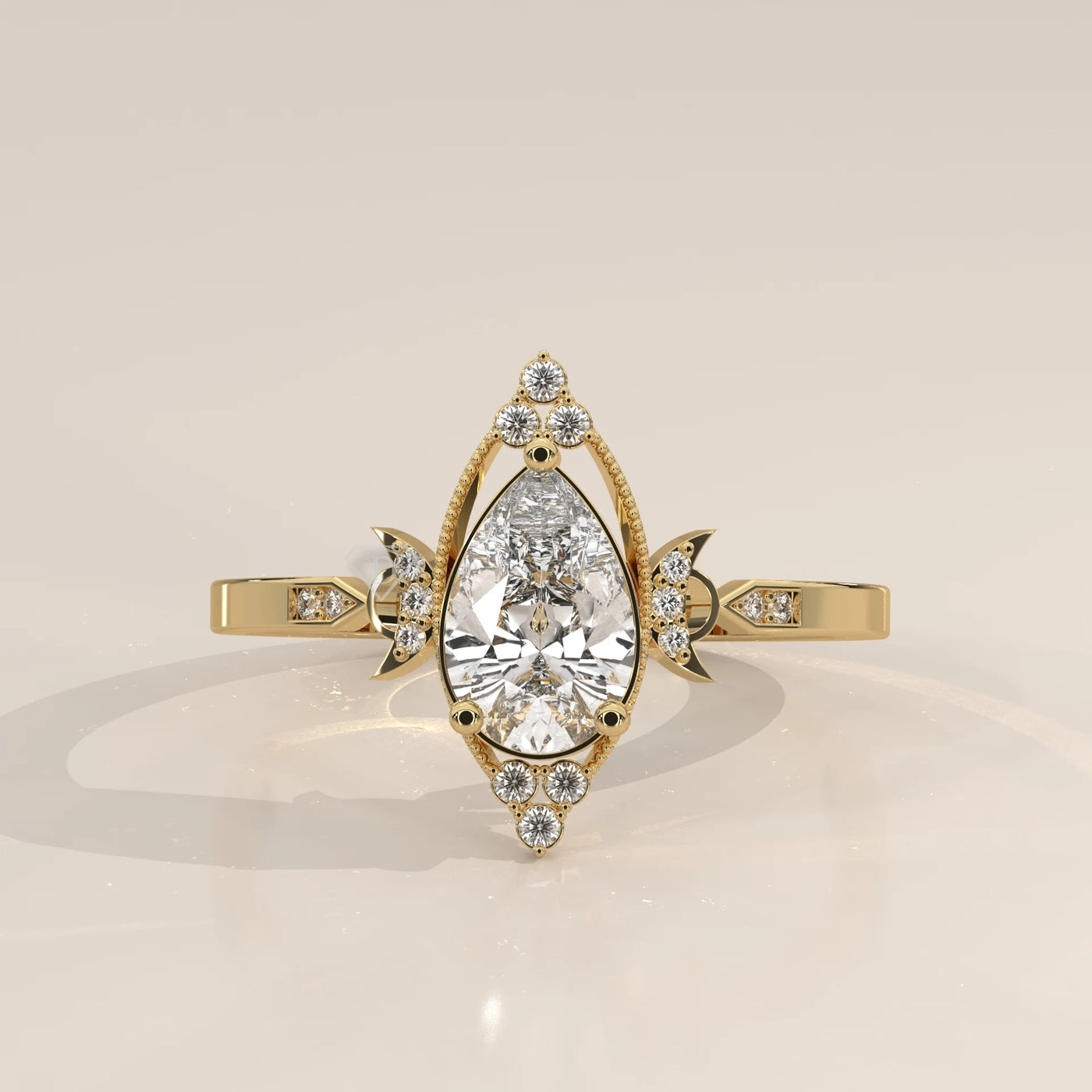 Elaborate yellow gold ring with a pear-shaped diamond center, accented with smaller stones.