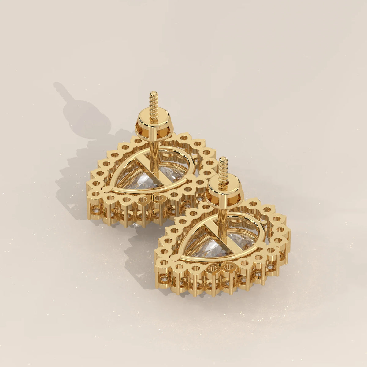 Pear Shape Halo Lab Grown Diamond Stud Earrings with Screw Backs in yellow gold, product photograph on a plain background.