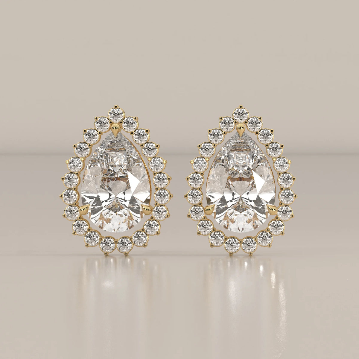 Pear Shape Halo Lab Grown Diamond Stud Earrings with Screw Backs in yellow gold, shown from the front.