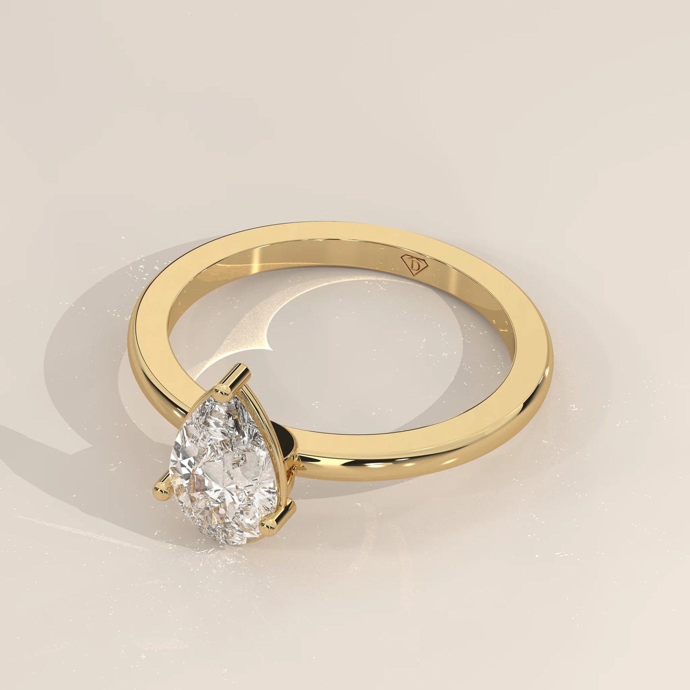 Angle View: Pear Diamond Engagement Ring with Solitaire Setting in Yellow Gold – Lab Grown – Driona Jewels