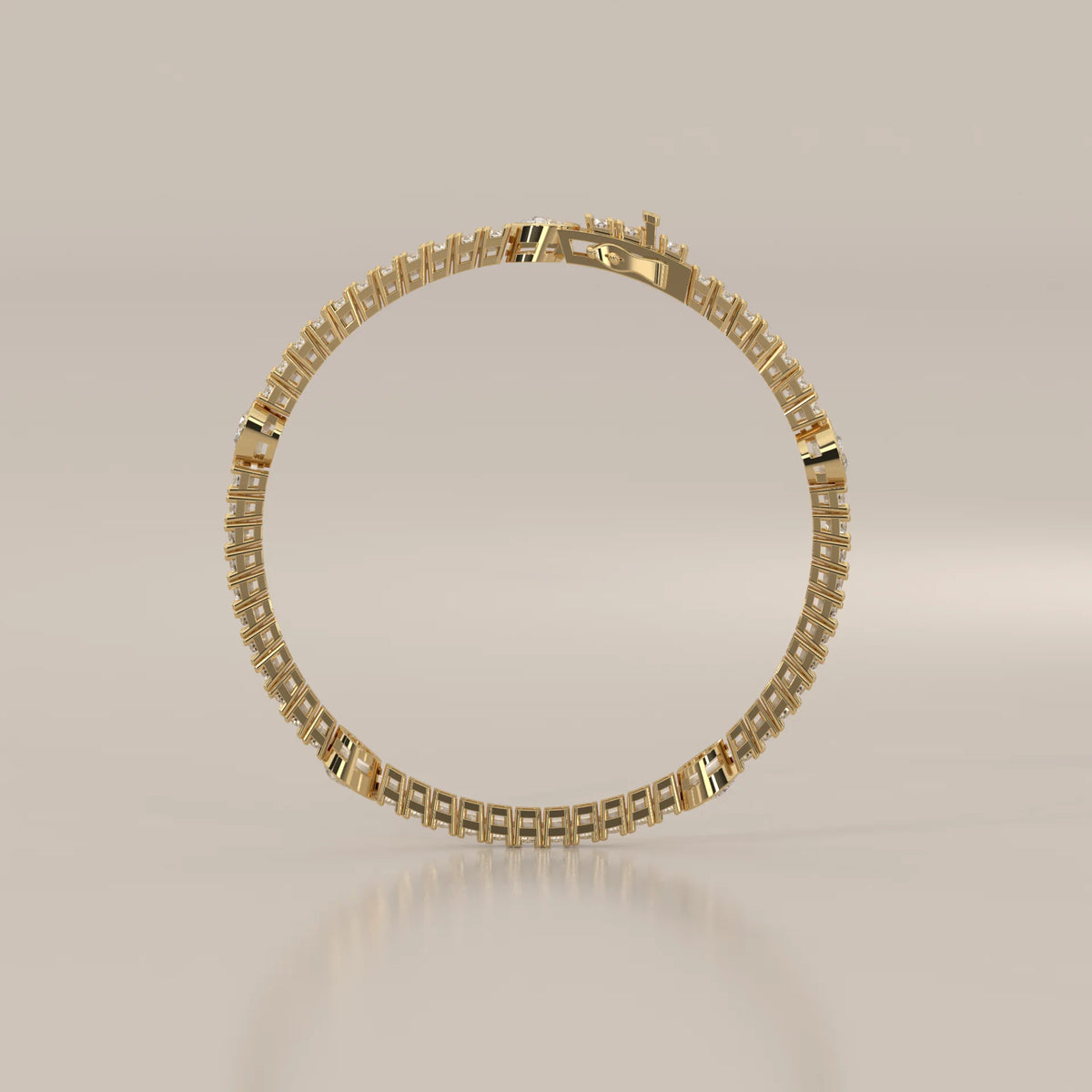 Pear Station Lab Grown Diamond Tennis Bracelet with Round Line in yellow gold, photographed from the side.