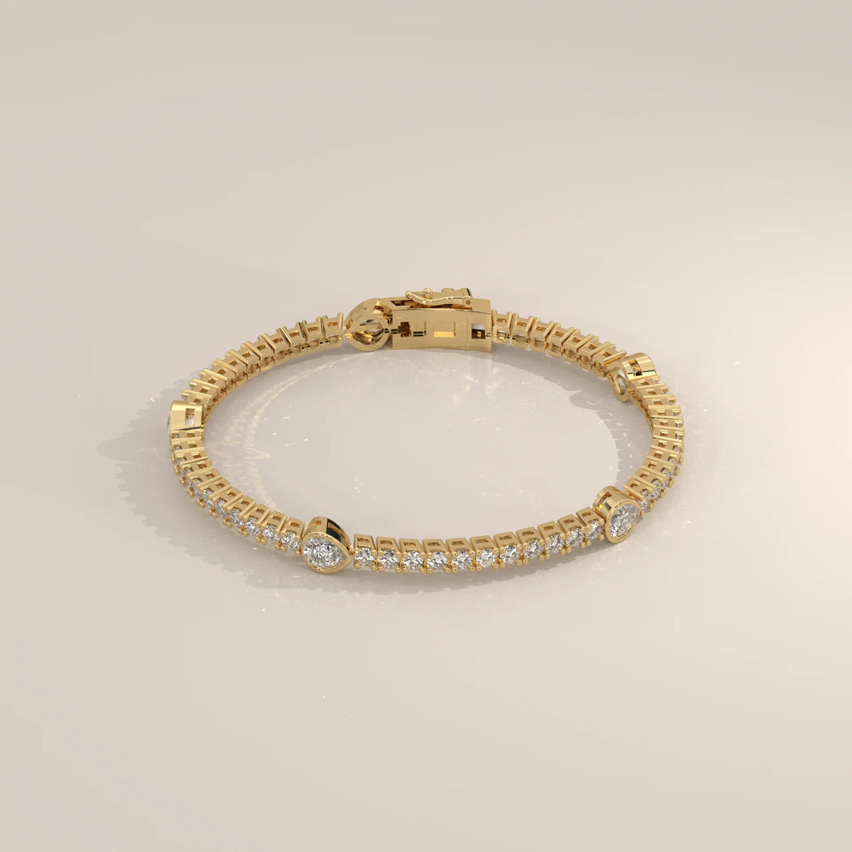 Pear Station Lab Grown Diamond Tennis Bracelet with Round Line in yellow gold, shown from the side.