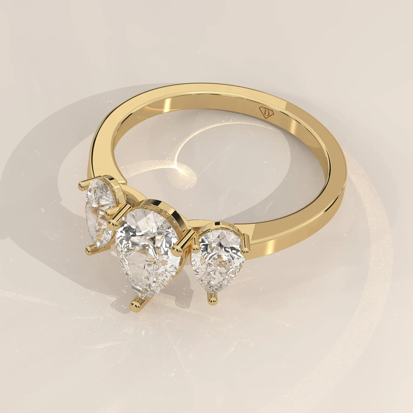 Angle View: Pear Diamond Ring with Three-Stone Setting in Yellow Gold – Lab Grown – Driona Jewels