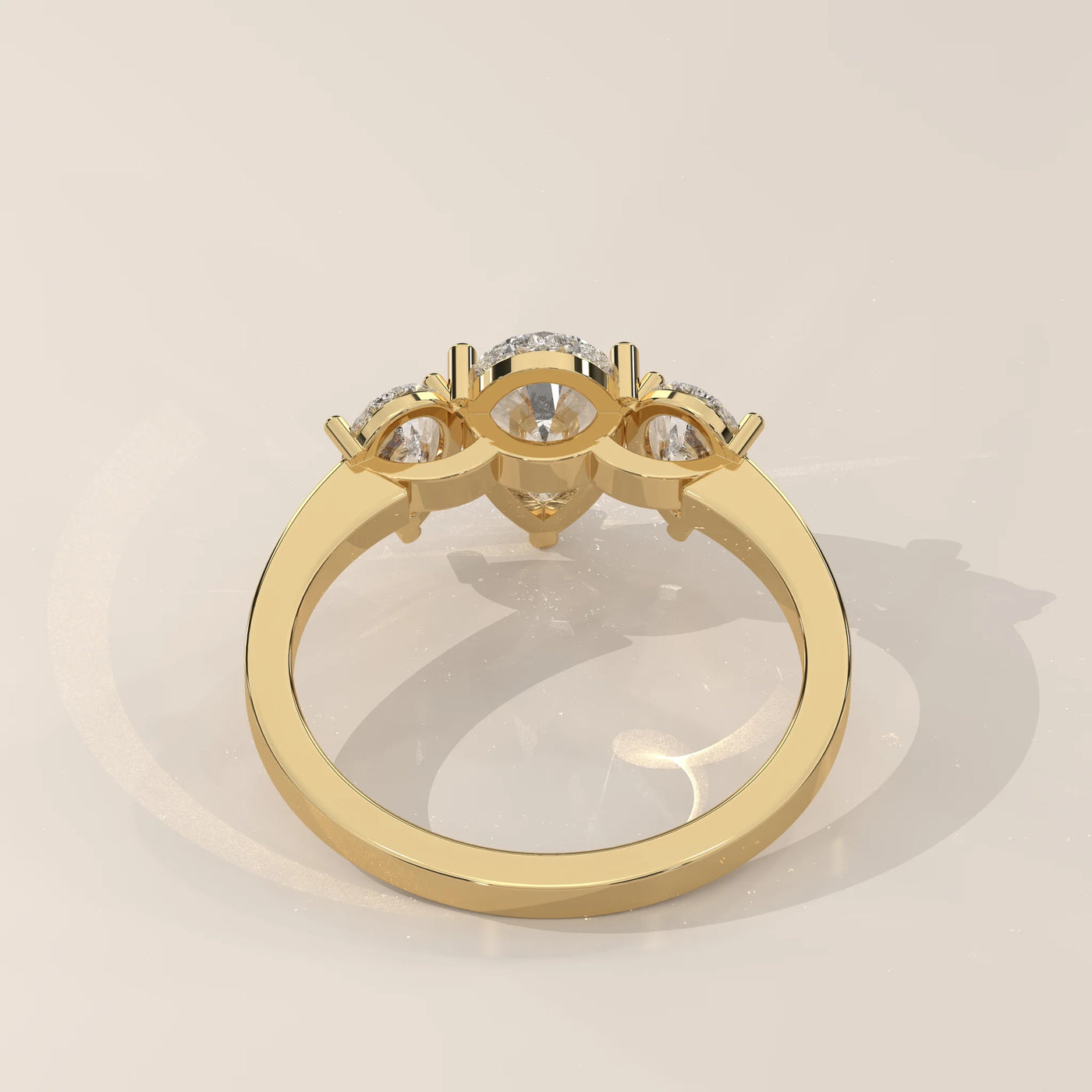 Top View: Pear Diamond Ring with Three-Stone Setting in Yellow Gold – Lab Grown – Driona Jewels