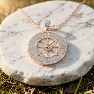 Flat-Lay: Compass Diamond Pendant with Pave Setting in 14k Rose Gold - Lab Grown - Driona Jewels