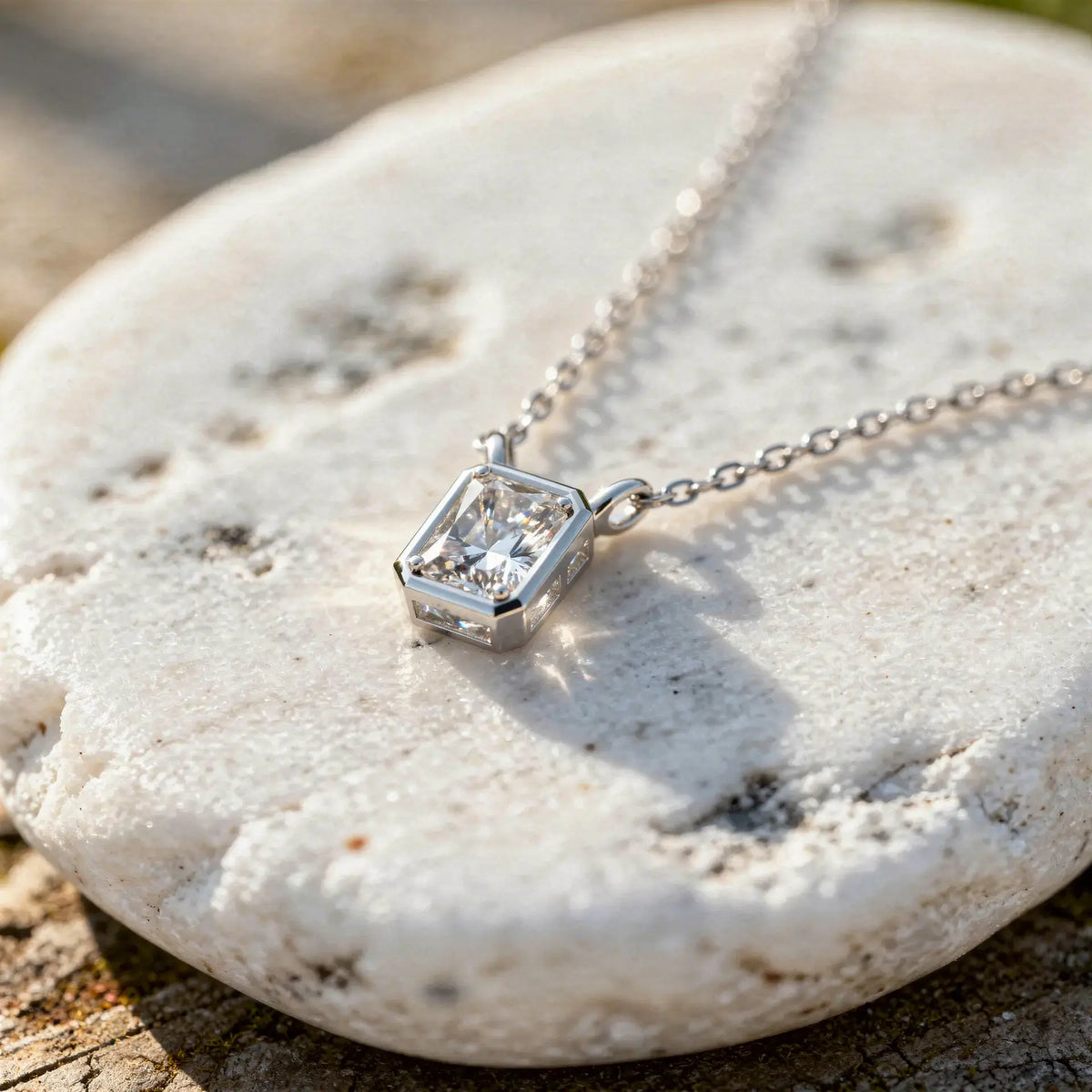 Close-up: Emerald Diamond Pendant with Bezel Setting in 925 Silver - Lab Grown - Driona Jewels