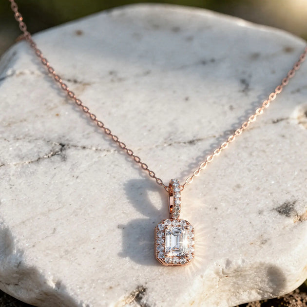 Close-up: Emerald Diamond Pendant with Halo Setting in 14k Rose Gold - Lab Grown - Driona Jewels