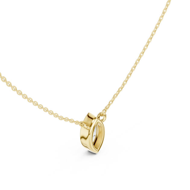 Flat Lay: Heart Diamond Pendant with Bezel Setting in 14k Gold - Lab Grown - Driona Jewels