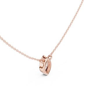 Flat-Lay: Heart Diamond Pendant with Bezel Setting in 14k Rose Gold - Lab Grown - Driona Jewels