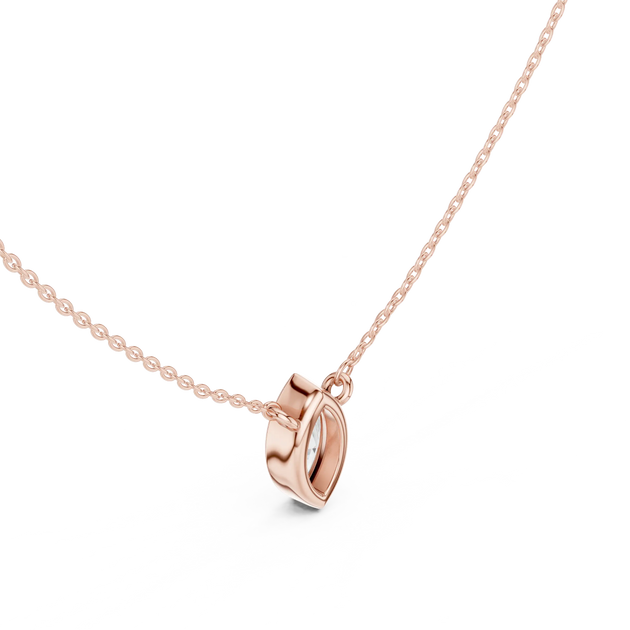 Flat-Lay: Heart Diamond Pendant with Bezel Setting in 14k Rose Gold - Lab Grown - Driona Jewels