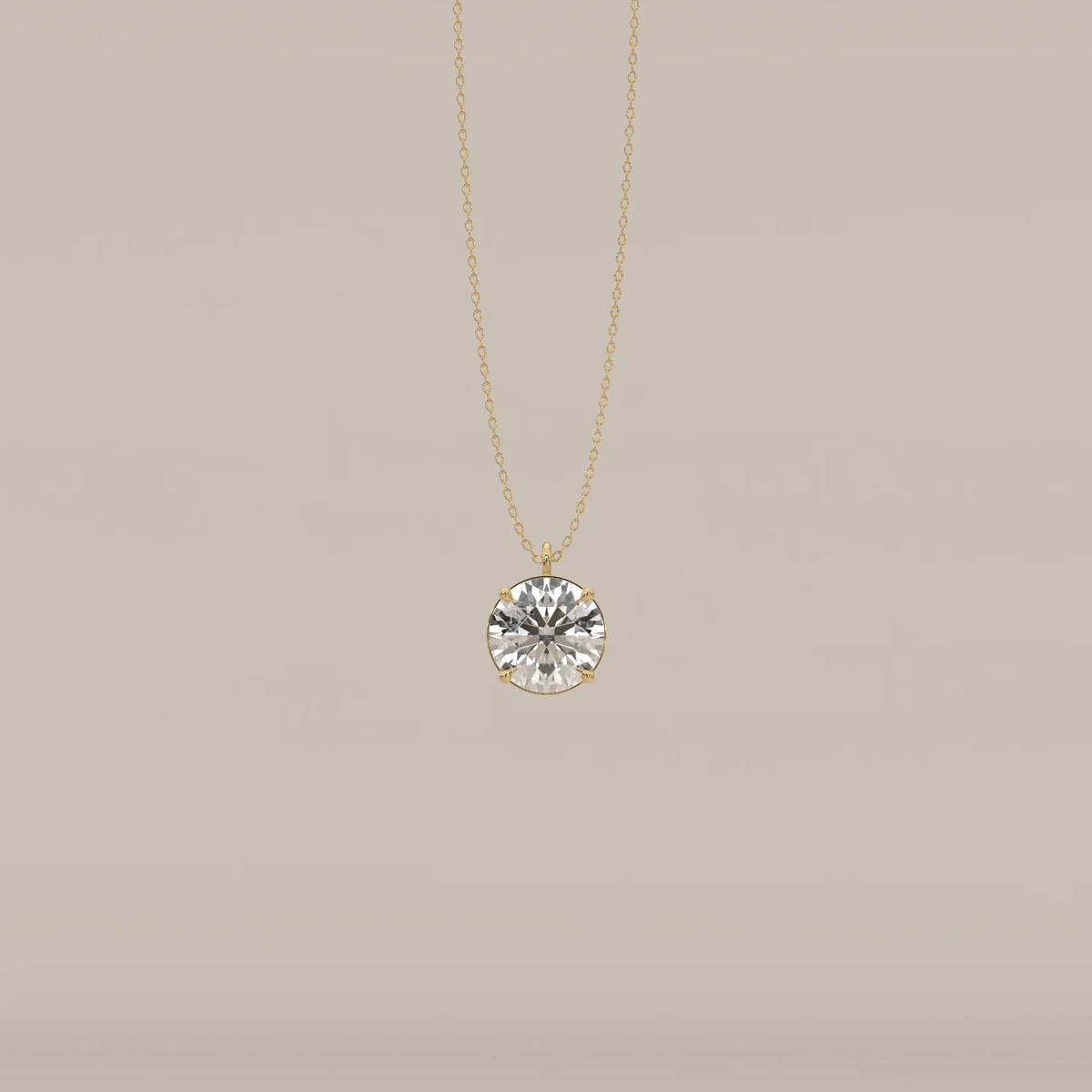 A 14k gold chain necklace with a large round brilliant cut diamond pendant.