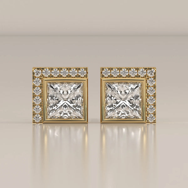 Princess Cut Bezel Lab Grown Diamond Studs with L Shaped Pave Edge in yellow gold, shown from the front.