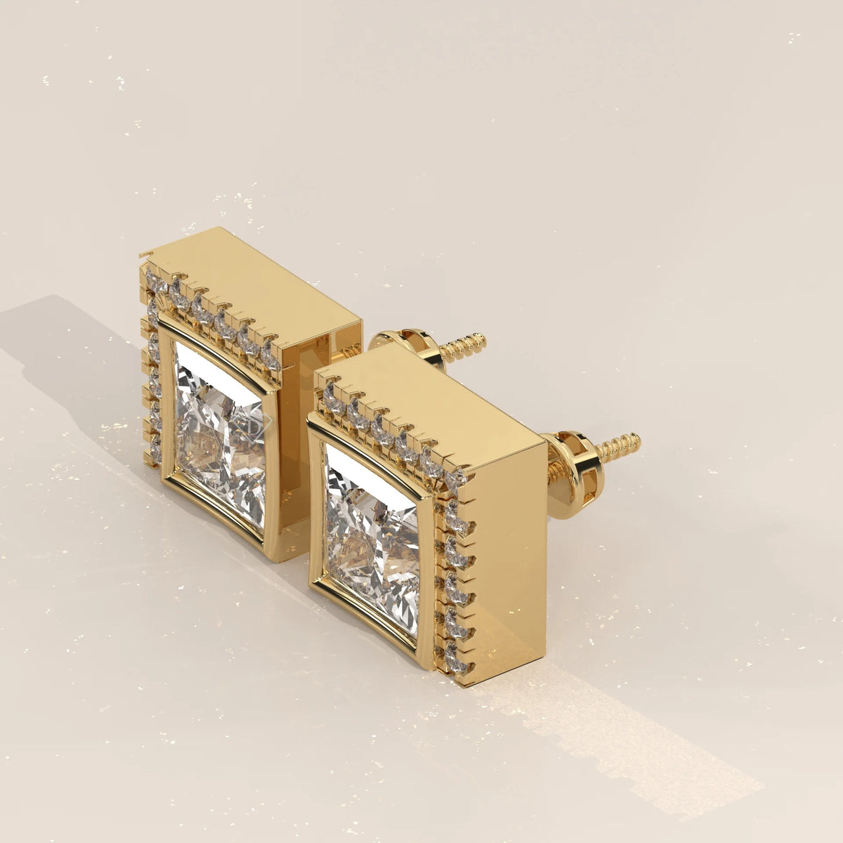 Princess Cut Bezel Lab Grown Diamond Studs with L Shaped Pave Edge in yellow gold, shown from the side.