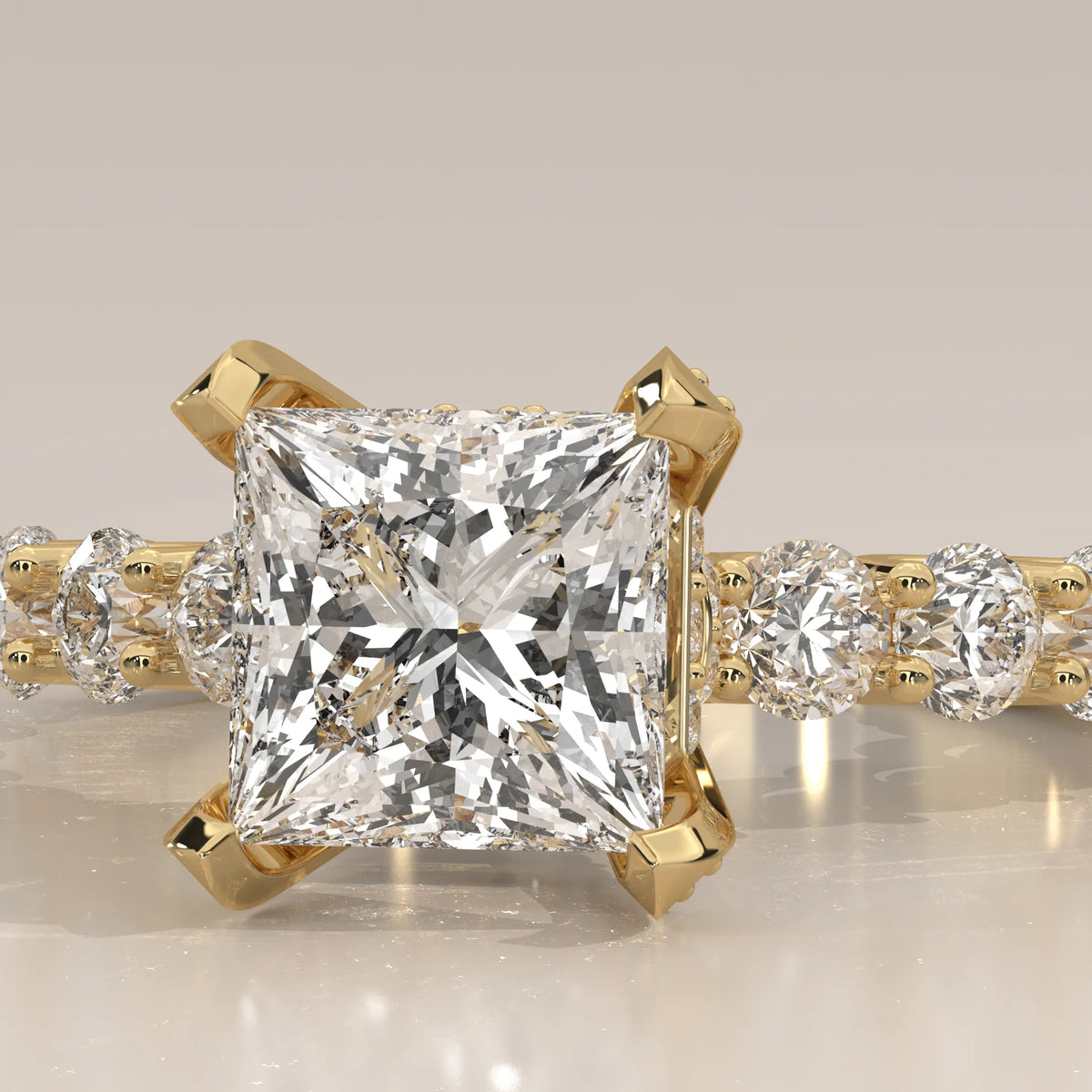 Princess Lab Grown Diamond Ring with Shared Claw Round Band in yellow gold, front view on a plain background.