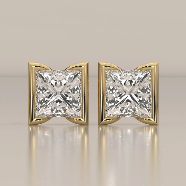 Princess Cut Half Bezel Lab Grown Diamond Studs with Flared Sides in yellow gold, shown from the front.