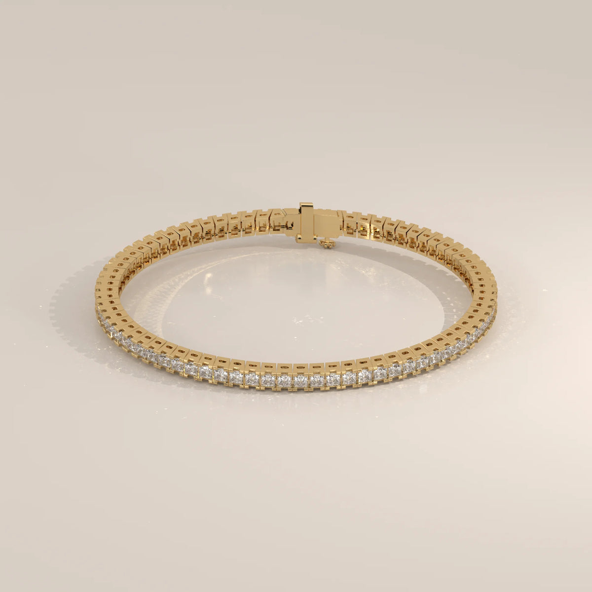 Princess Cut Lab Grown Diamond Tennis Bracelet in Box Settings in yellow gold, shown on a plain background.