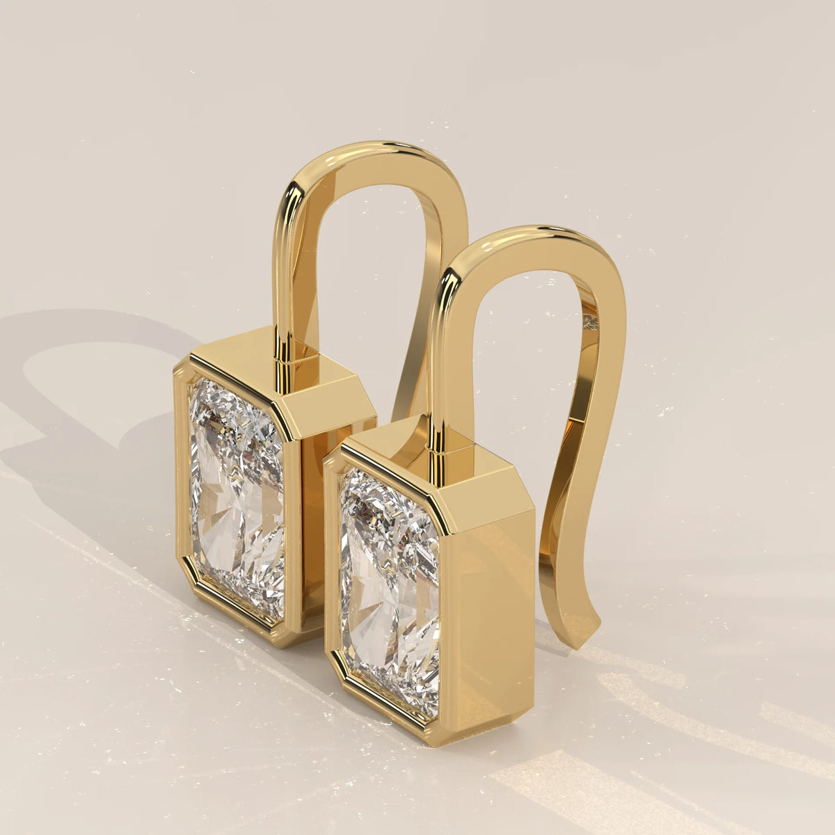 Radiant Cut Bezel Lab Grown Diamond Drop Earrings on Gold Hook in yellow gold, photographed head-on.