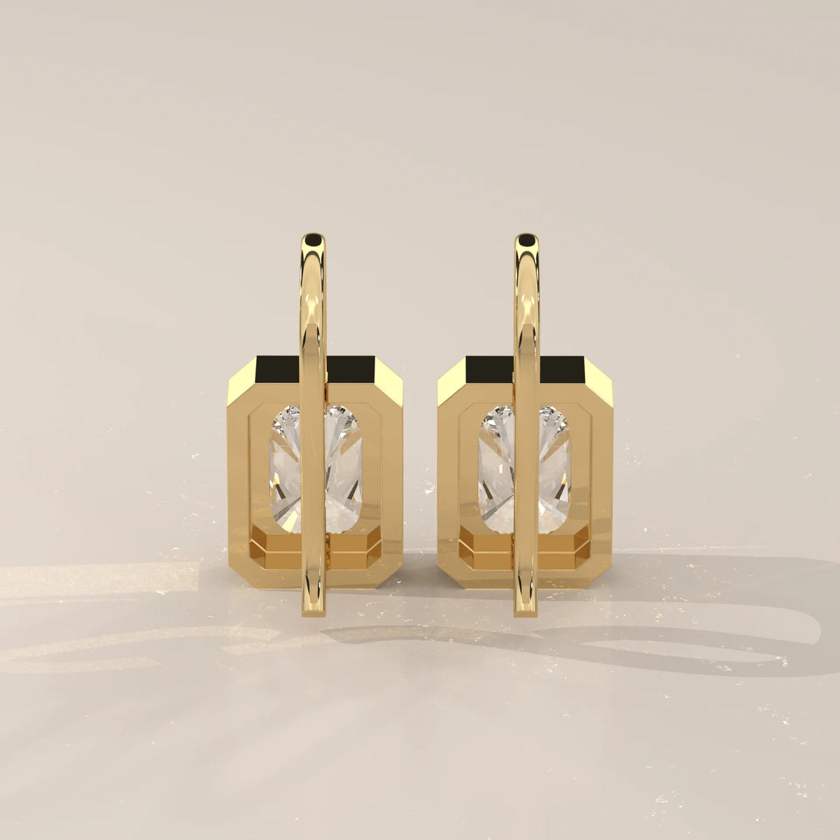 Radiant Cut Bezel Lab Grown Diamond Drop Earrings on Gold Hook in yellow gold, front view on a plain background.