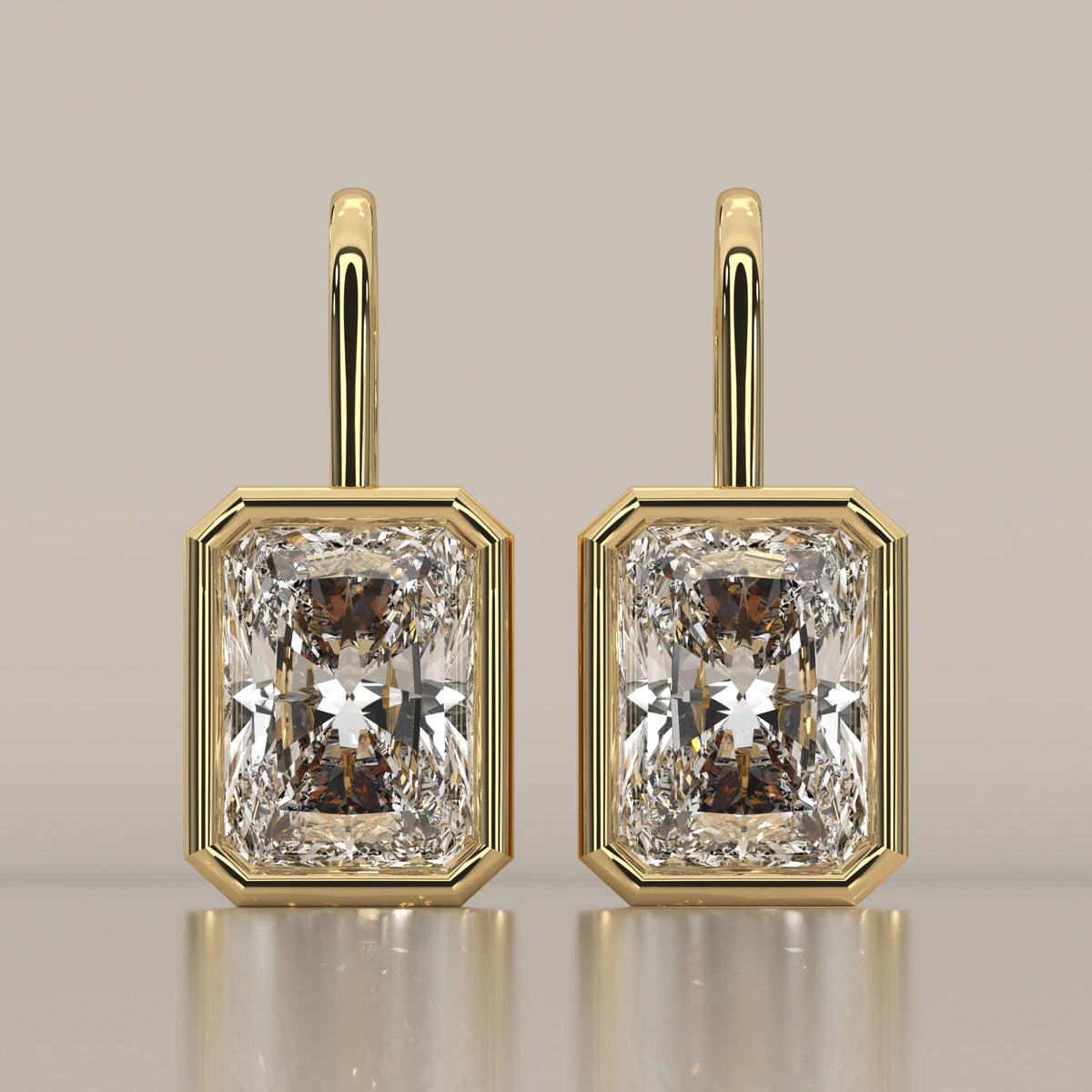 Radiant Cut Bezel Lab Grown Diamond Drop Earrings on Gold Hook in yellow gold, shown from the front.