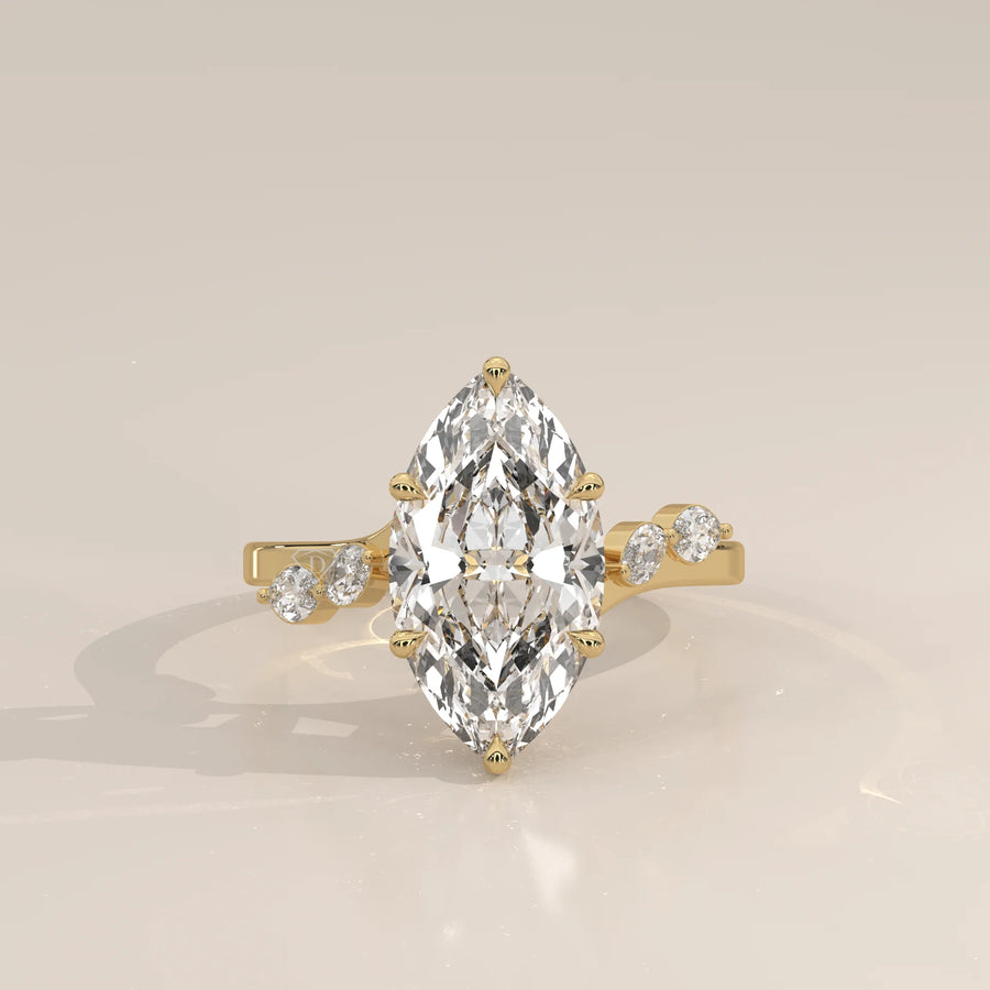Reylona 5 Carat Marquise Lab Grown Diamond Ring, Scattered Accents in yellow gold, photographed head-on.