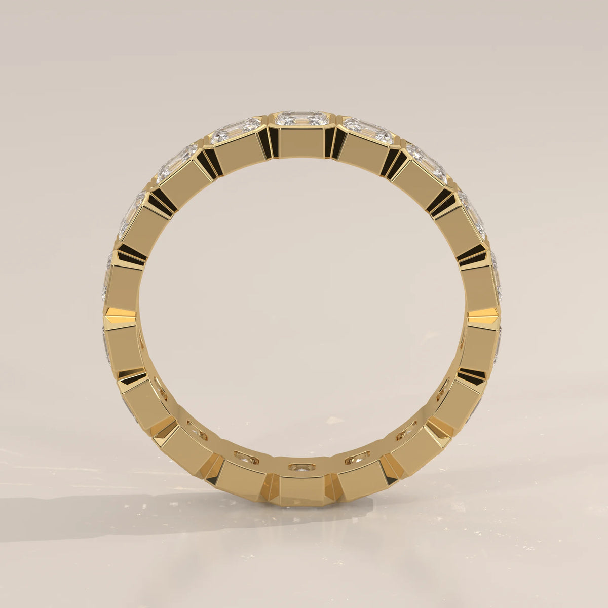 Square Emerald Cut Lab Grown Diamond Bezel Set Eternity Band in yellow gold, studio product photograph.