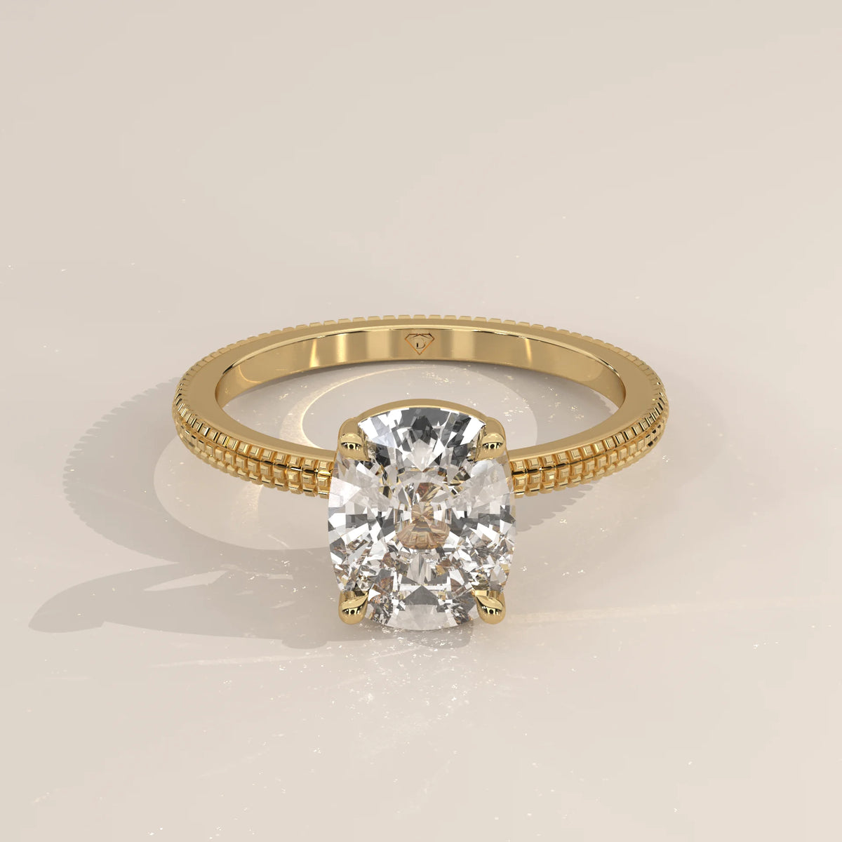 A cushion-cut diamond engagement ring in 14k yellow gold with pavé band.
