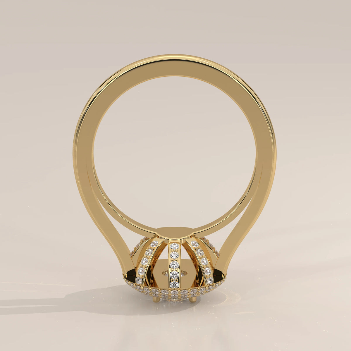 Round Lab Grown Diamond Domed Triple Halo Pave Ring in yellow gold, photographed at a three-quarter angle.
