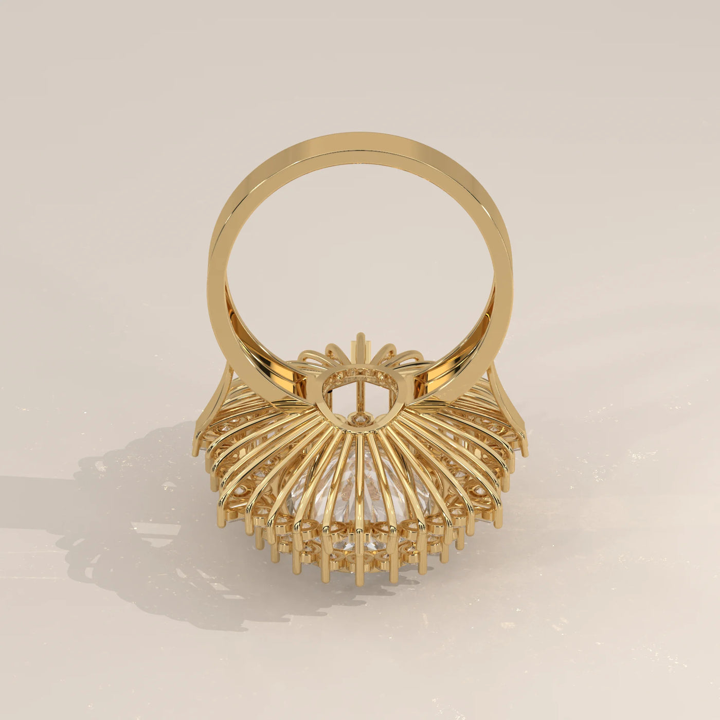 A detailed view of a gold ring with intricate stonework, seen from the back.