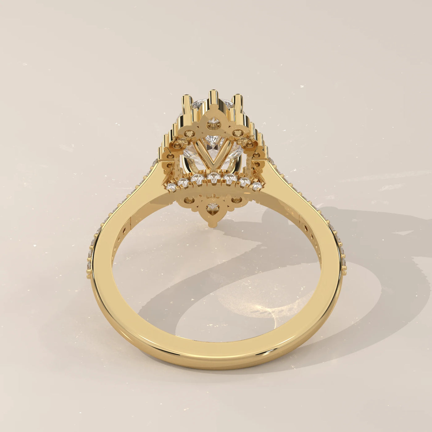 A 14k gold ring with diamonds surrounding a central diamond, viewed from the back.