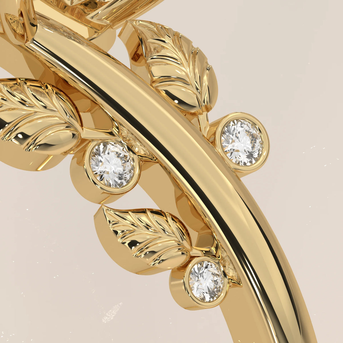 A close-up view of a delicate gold ring with small diamonds and leaf designs.