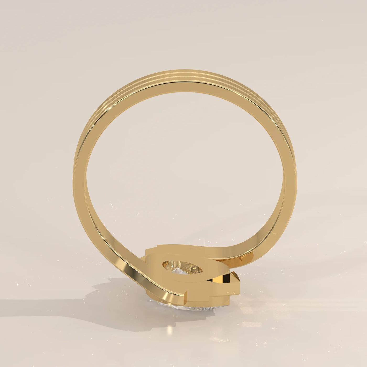 Gold ring with a clear stone, side view.