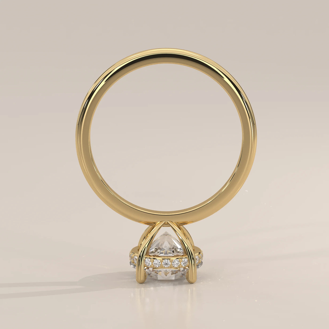 Side view of a 14k gold ring with a large diamond and diamond accents.