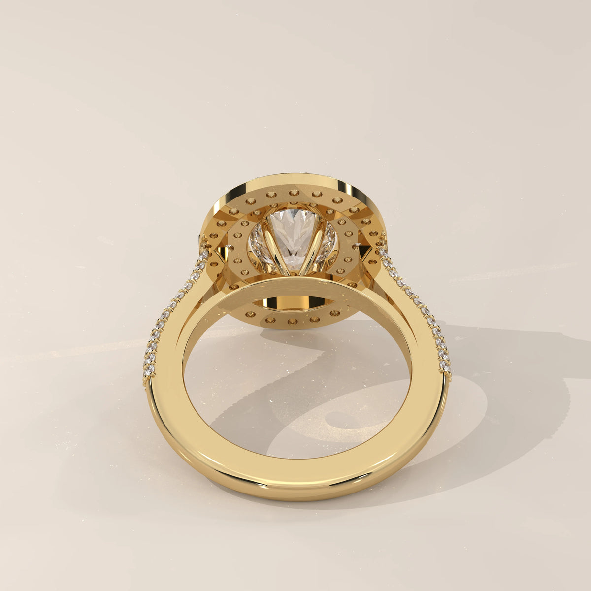 Oval Lab Grown Diamond Double Halo Ring with Pointed Inner Frame in yellow gold, shown on a plain background.