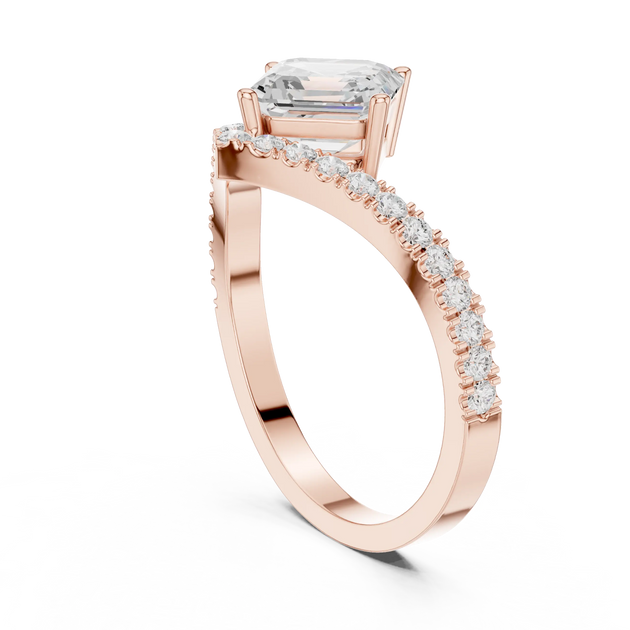 Angle View: Emerald Diamond Ring with Pave Split Shank Setting in 14K Rose Gold – Lab Grown – Driona Jewels
