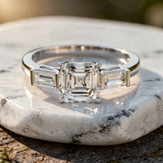 Close-up: Emerald Cut Diamond Ring with Three Stone Setting in 14k White Gold - Lab Grown - Driona Jewels