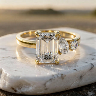 Front-view: Emerald Cut Diamond Ring with Three Stone Setting in 14k Yellow Gold - Lab Grown - Driona Jewels