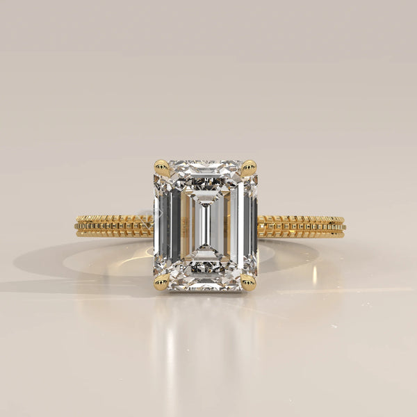 Emerald cut diamond engagement ring in 14k yellow gold
