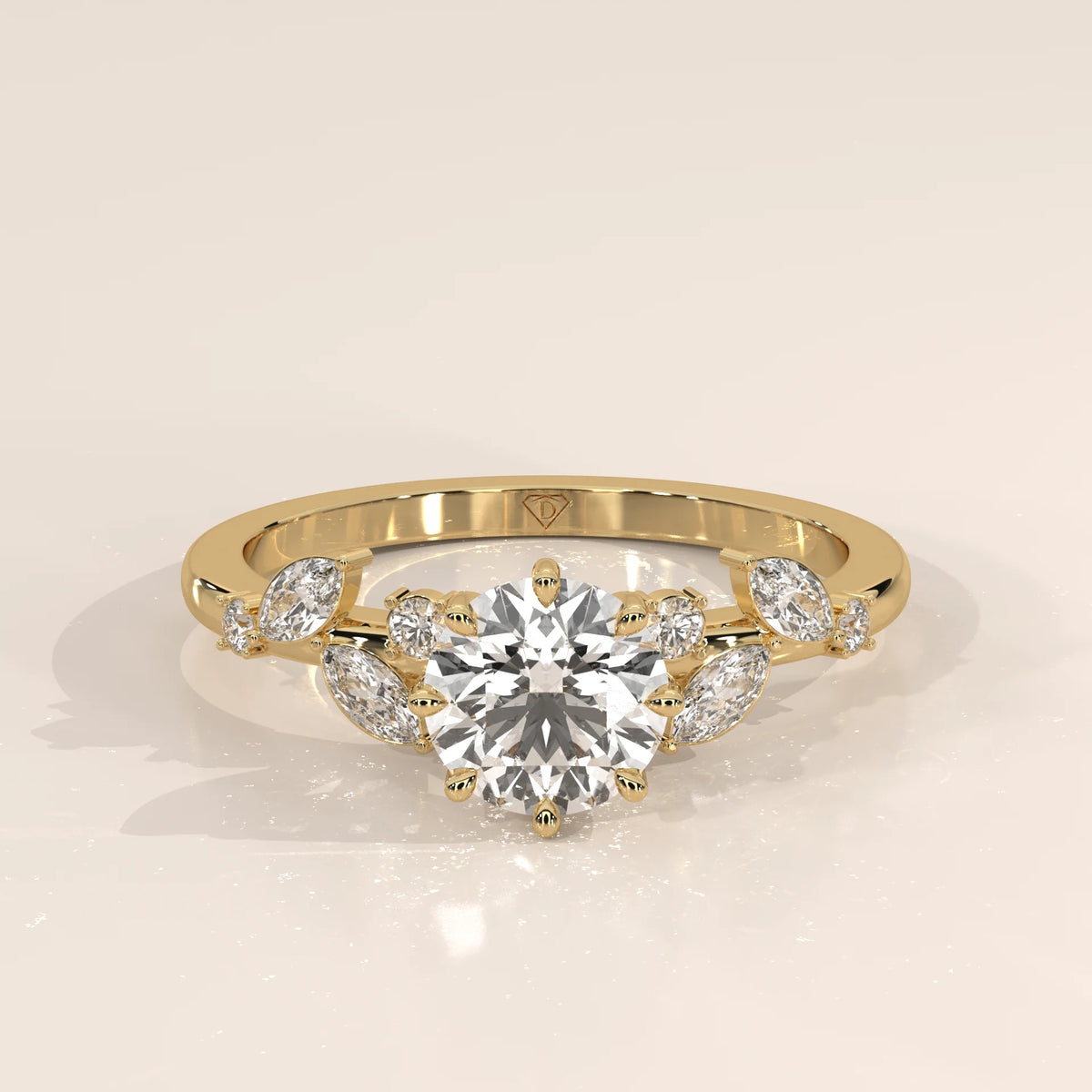 A 14k yellow gold ring with a round center diamond and floral accents.