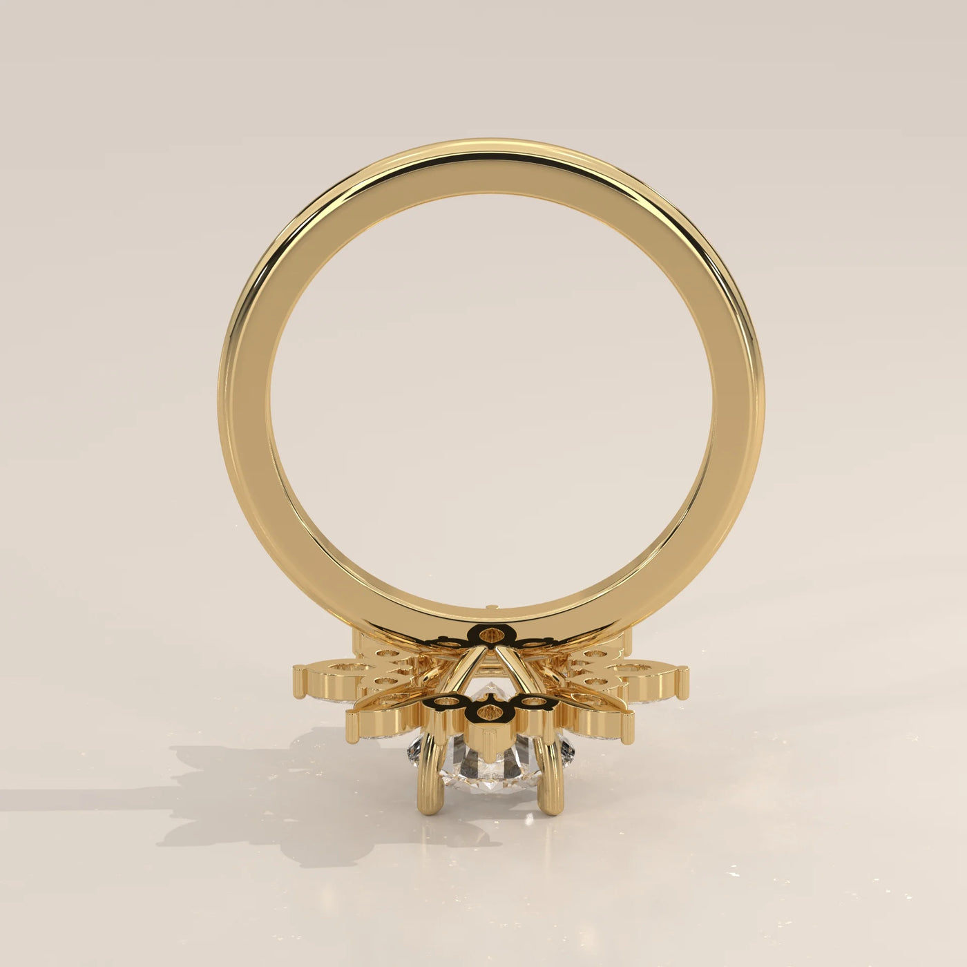 Yellow gold ring with a floral design of diamonds and pear-shaped stones.