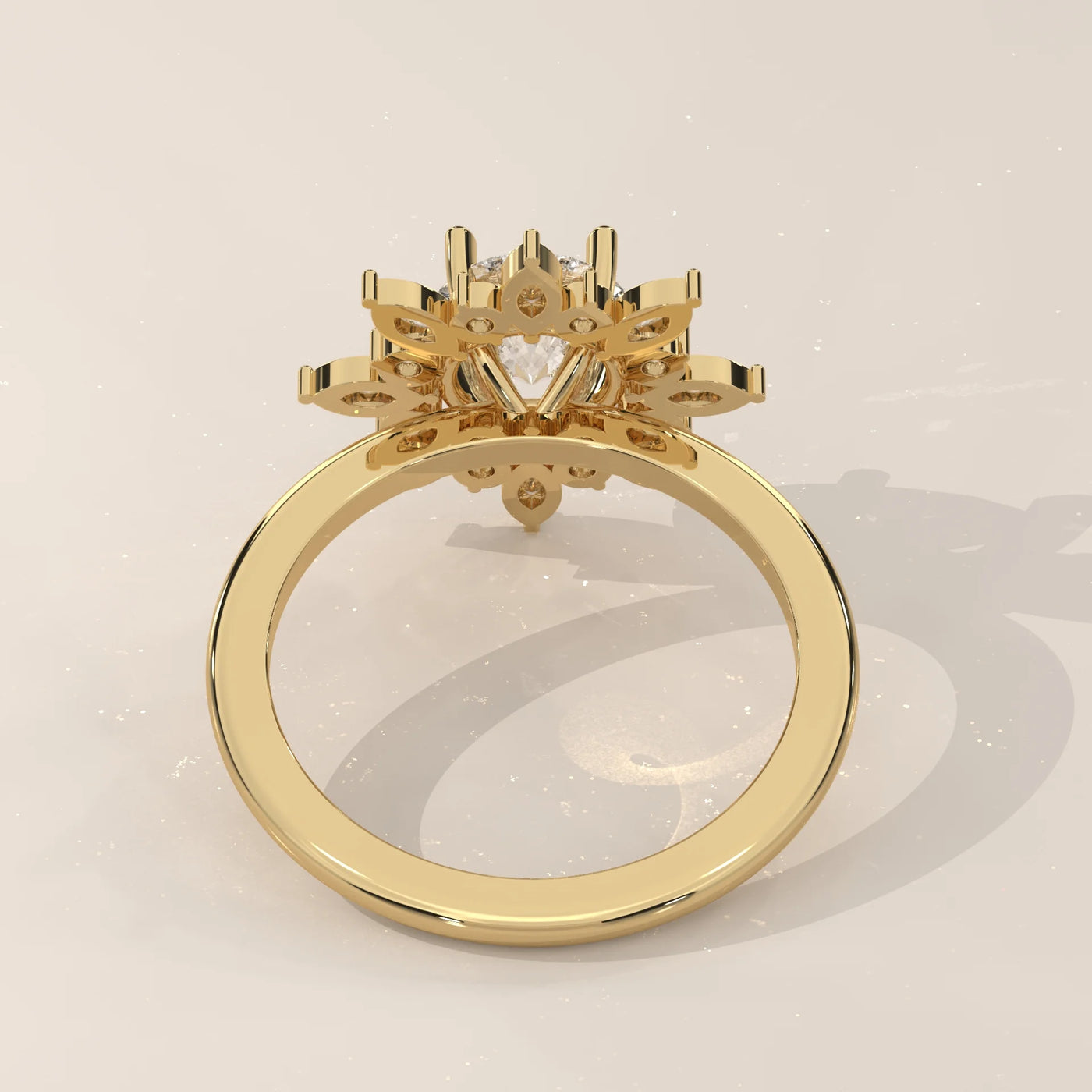 Gold ring with a floral-shaped diamond halo setting, back view.
