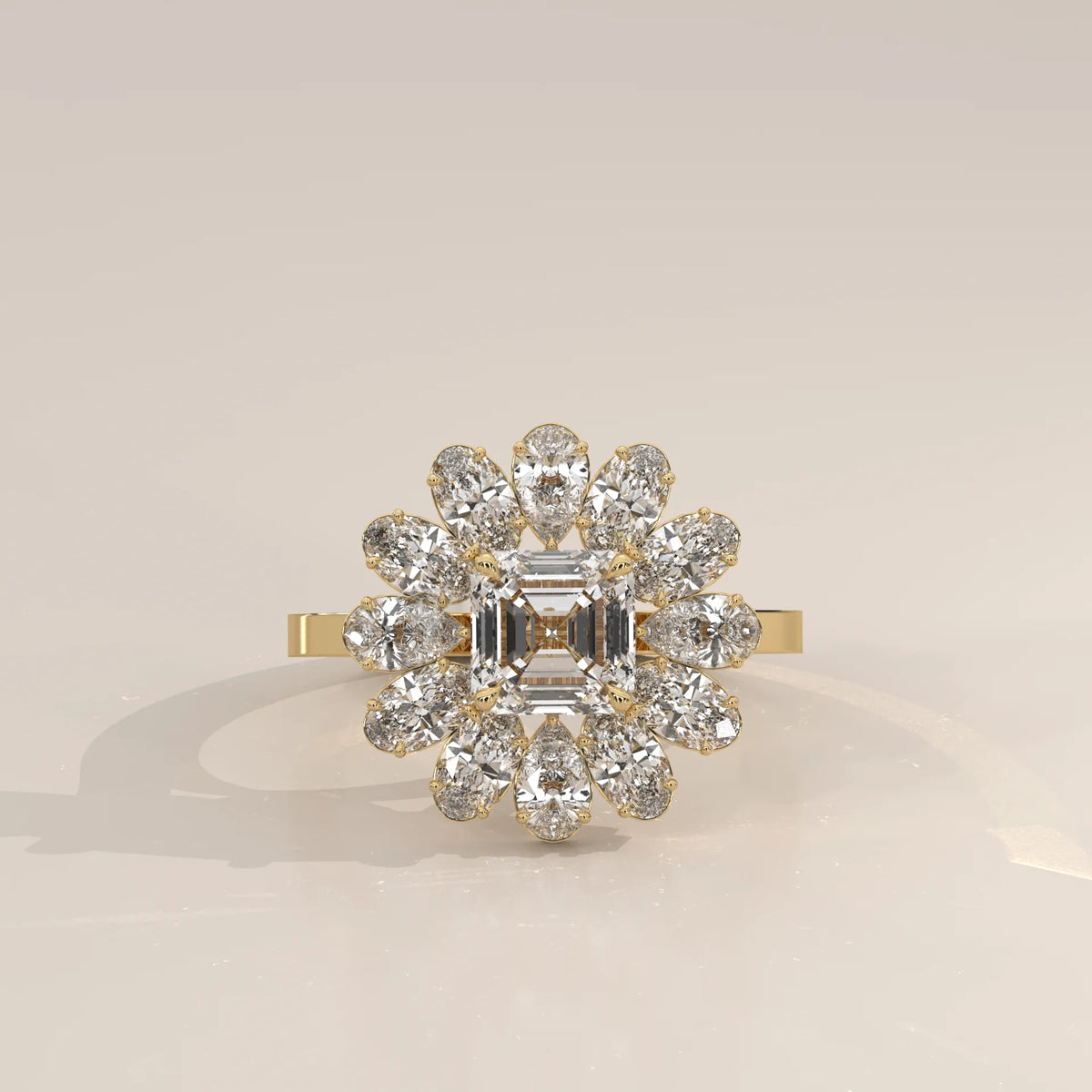 Square Emerald Cut Lab Grown Diamond Flower Cluster Ring in yellow gold, photographed head-on.