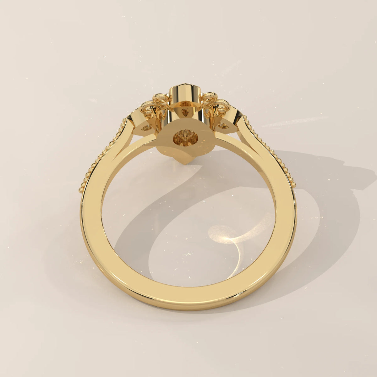 Oval Lab Grown Diamond Vintage Ring with Four Heart Accents in yellow gold, shown at an angle.