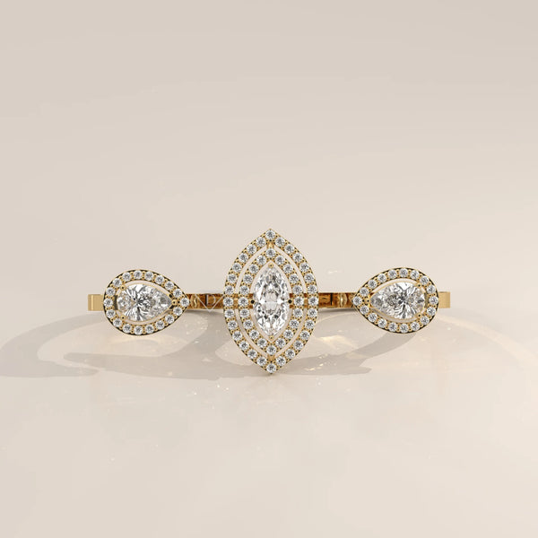 Marquise Lab Grown Diamond Double Halo Two Finger Ring with Pear Ends in yellow gold, photographed head-on.